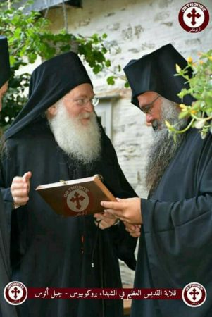 Rt. Rev. Archim. Ephraim (left), Rt. Rev. Archim. Kyrillos (right)